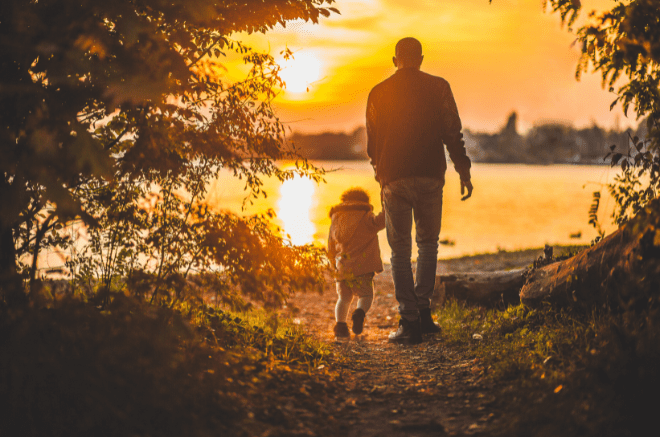 man and child walking towards lake, appealing tribunal