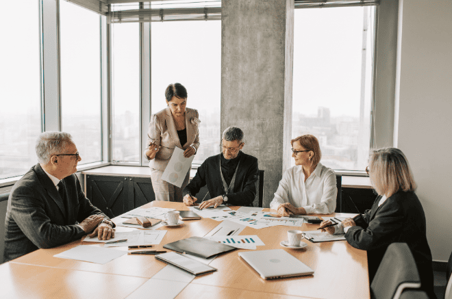 A group of business people sat around a table